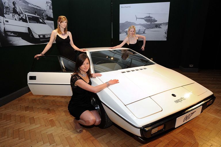 https://www.gettyimages.com/detail/news-photo/bonhams-staff-pose-with-the-white-1976-lotus-esprit-from-news-photo/834883150