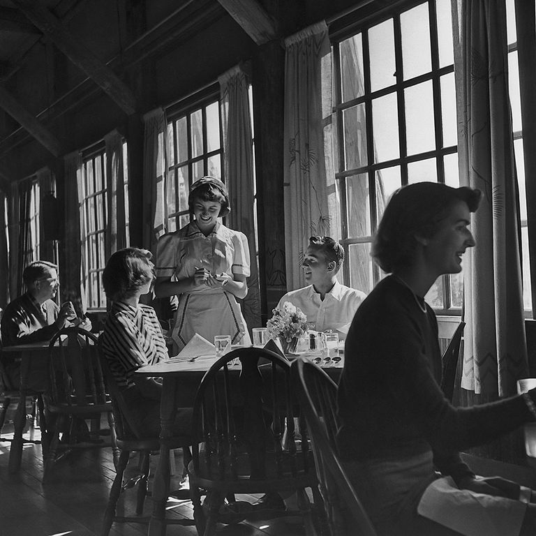 https://www.gettyimages.com/detail/news-photo/waitress-serving-a-couple-in-a-restaurant-circa-1940s-news-photo/107712349