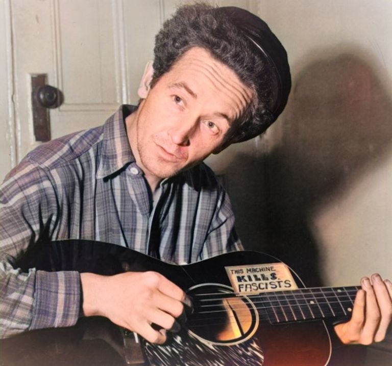 https://www.gettyimages.co.uk/detail/news-photo/portrait-photograph-of-woody-guthrie-american-singer-news-photo/506023767