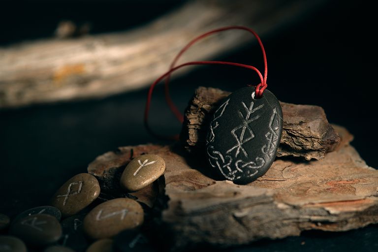 https://www.gettyimages.com/detail/photo/runic-talisman-runescript-surrounded-by-runes-royalty-free-image/1809982263?phrase=vikings+Religion+