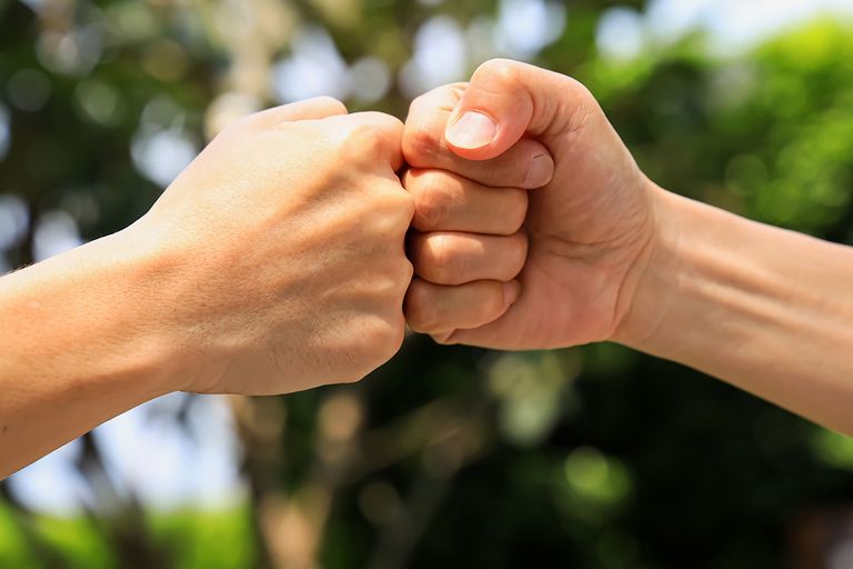 https://www.gettyimages.com/detail/photo/deal-of-teamwork-with-the-man-hand-a-fist-bump-royalty-free-image/1939596255?phrase=fist+bump+gathering+