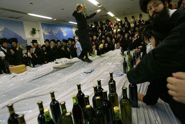 https://www.gettyimages.co.uk/detail/news-photo/ultra-orthodox-jews-sing-and-dance-at-the-wine-filled-table-news-photo/51214824