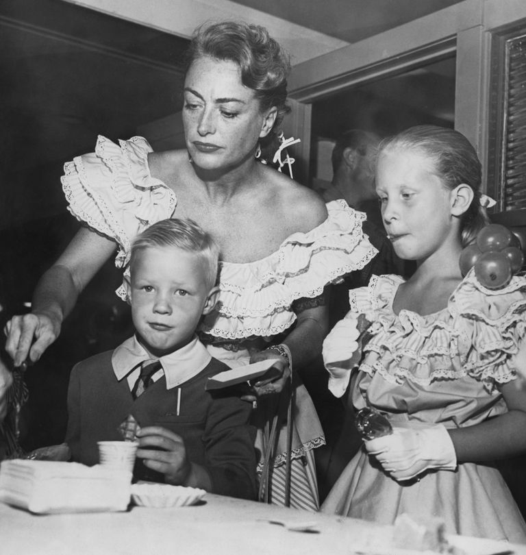 https://www.gettyimages.com/detail/news-photo/american-actress-joan-crawford-with-her-children-news-photo/940105050