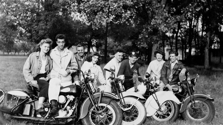 https://www.gettyimages.com/detail/news-photo/young-adults-ready-for-a-ride-on-their-motorcycles-1949-news-photo/526266956