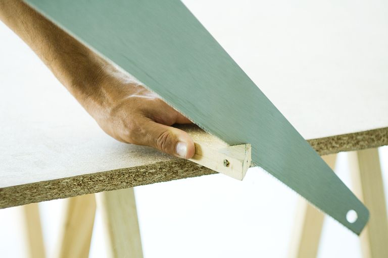 https://www.gettyimages.com/detail/photo/man-sawing-wood-cropped-view-of-hand-royalty-free-image/77806733?phrase=Cutting+corners+
