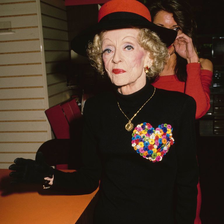 https://www.gettyimages.com/detail/news-photo/american-actress-bette-davis-wearing-a-red-and-black-hat-news-photo/1333423572