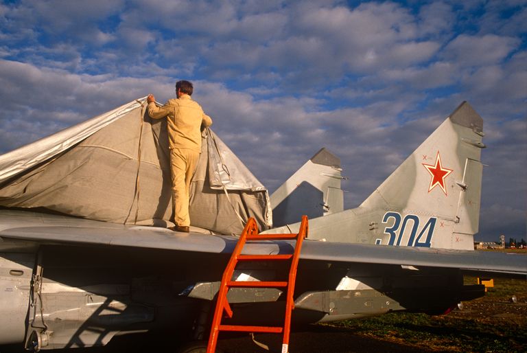 https://www.gettyimages.co.uk/detail/news-photo/migoyan-technician-covers-a-mikoyan-mig-29-fighter-jet-as-news-photo/527480616