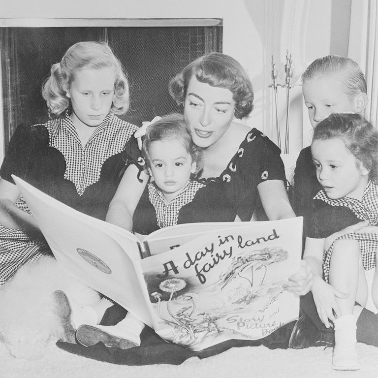 https://www.gettyimages.com/detail/news-photo/actress-joan-crawford-reads-a-book-to-her-children-the-news-photo/514975192