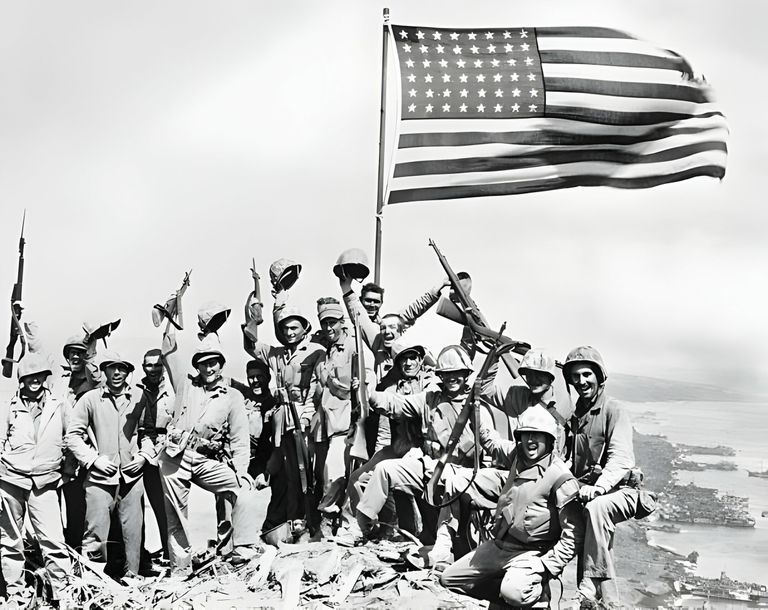 https://www.gettyimages.co.uk/detail/news-photo/united-states-marines-pose-on-top-of-mount-suribachi-on-the-news-photo/514698228