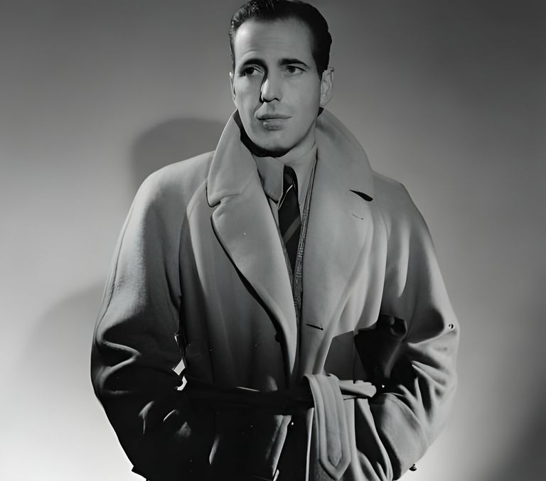 https://www.gettyimages.co.uk/detail/news-photo/humphrey-bogart-dons-a-trench-coat-during-a-publicity-shoot-news-photo/88803945