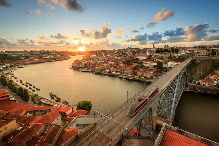 https://www.gettyimages.co.uk/detail/photo/sunset-over-the-beautiful-city-of-porto-royalty-free-image/180459655?phrase=porto%2C+portugal+