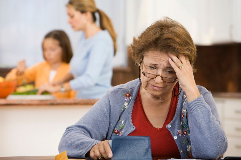 https://www.gettyimages.co.uk/detail/photo/worried-hispanic-woman-writing-checks-in-kitchen-royalty-free-image/87294571?phrase=mother+with+money