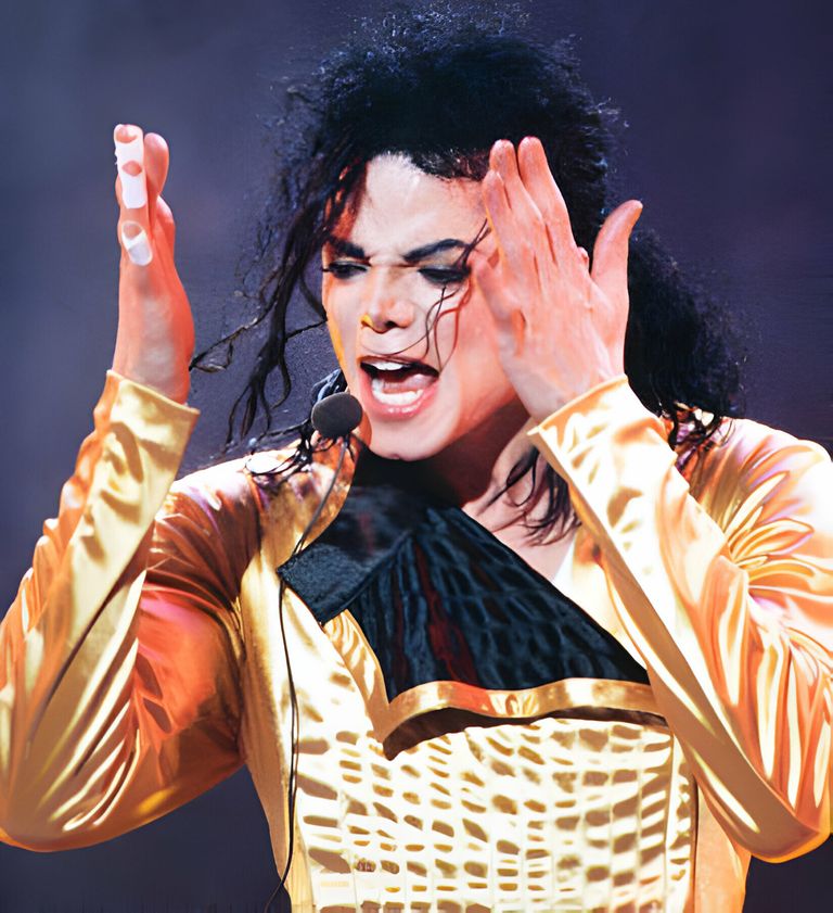 https://www.gettyimages.co.uk/detail/news-photo/singer-michael-jackson-performs-on-stage-at-wembley-stadium-news-photo/1022300106