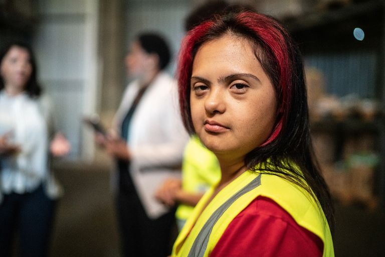 https://www.gettyimages.co.uk/detail/photo/portrait-of-a-disabled-young-woman-in-a-warehouse-royalty-free-image/1459657696