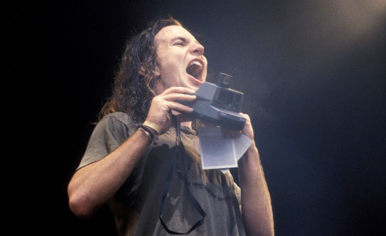 https://www.gettyimages.co.uk/detail/news-photo/singer-eddie-vedder-of-american-band-pearl-jam-performs-news-photo/120062898
