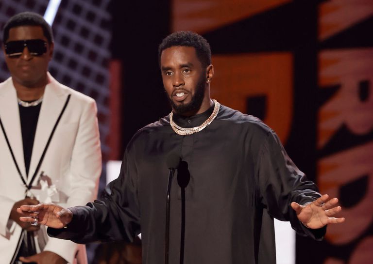 https://www.gettyimages.co.uk/detail/news-photo/babyface-and-sean-diddy-combs-speak-onstage-during-the-2022-news-photo/1405338113