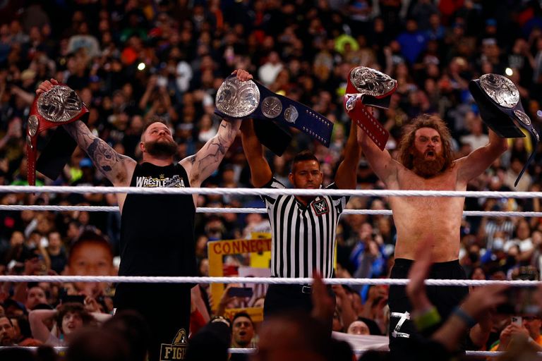 https://www.gettyimages.co.uk/detail/news-photo/kevin-owens-and-sami-zayn-after-defeating-the-usos-for-the-news-photo/1478926940