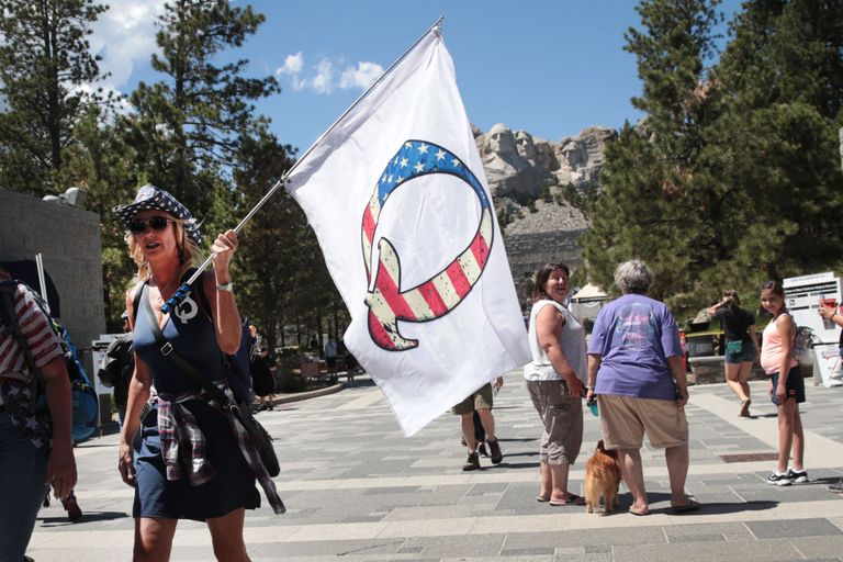 https://www.gettyimages.com/detail/news-photo/donald-trump-supporter-holding-a-qanon-flag-visits-mount-news-photo/1253731786