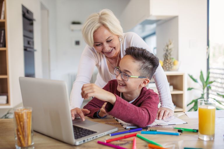 https://www.gettyimages.co.uk/detail/photo/mother-and-son-doing-homework-at-home-royalty-free-image/1058505406