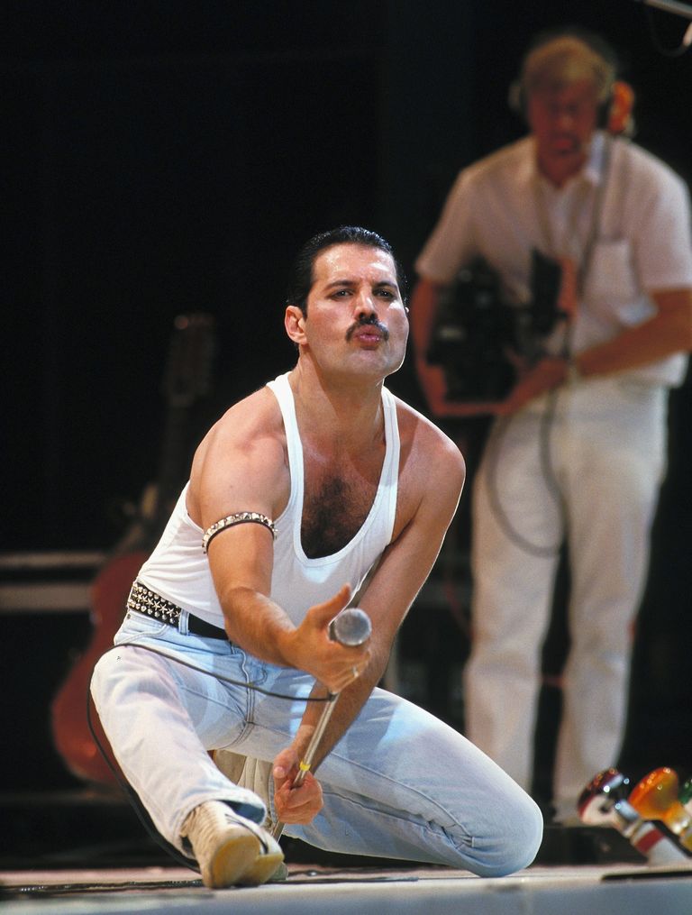 https://www.gettyimages.co.uk/detail/news-photo/freddie-mercury-of-queen-performs-on-stage-during-the-live-news-photo/52468667