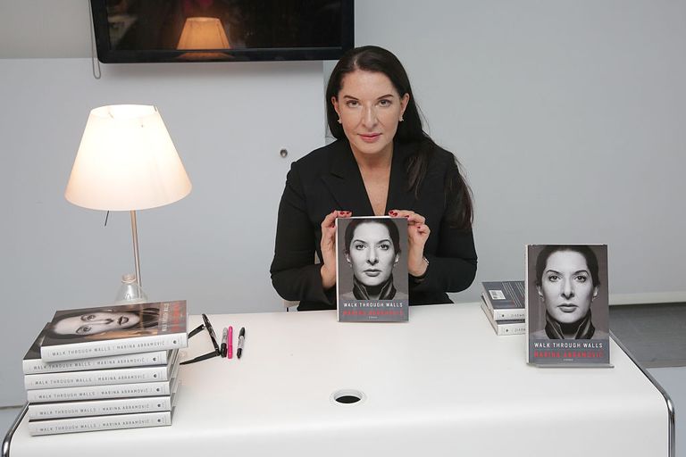 https://www.gettyimages.co.uk/detail/news-photo/performance-artist-marina-abramovic-poses-with-a-copy-of-news-photo/629597644