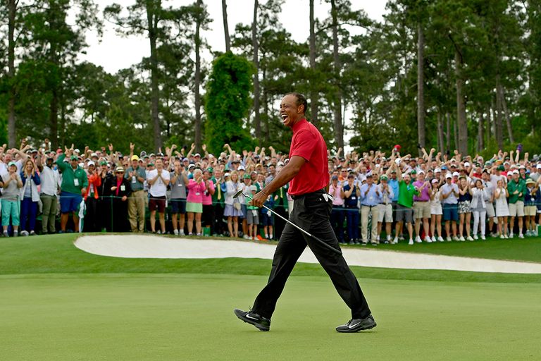 https://www.gettyimages.com/detail/news-photo/masters-champion-tiger-woods-celebrates-after-he-made-his-news-photo/1286582454