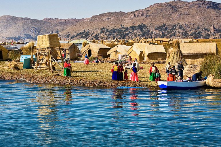 https://www.gettyimages.com/detail/photo/group-of-people-in-a-village-lake-titicaca-uros-royalty-free-image/79196954?phrase=peru+village+1950s