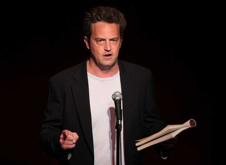 https://www.gettyimages.com/detail/news-photo/matthew-perry-performs-at-the-celebrity-autobiography-in-news-photo/88509639