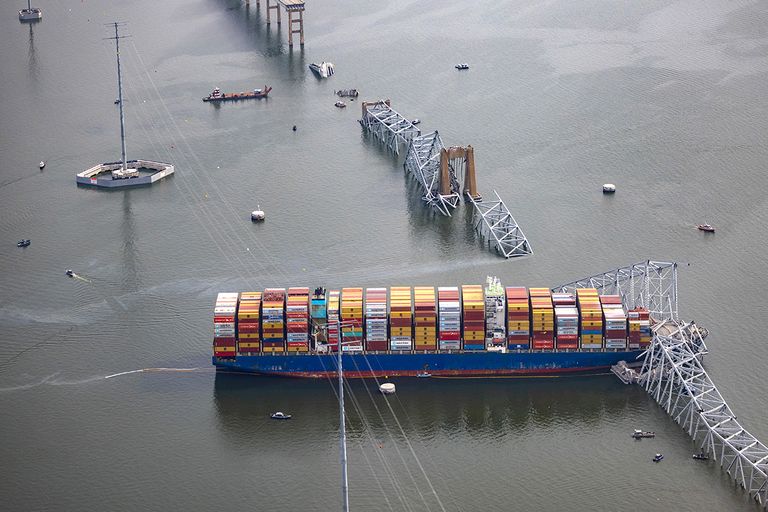 https://www.gettyimages.com/detail/news-photo/in-an-aerial-view-the-cargo-ship-dali-sits-in-the-water-news-photo/2115097543