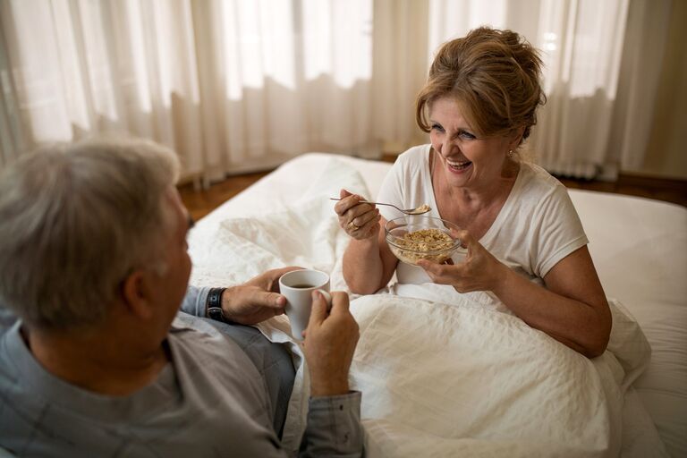 https://www.gettyimages.co.uk/detail/photo/cheerful-elderly-couple-communicating-during-royalty-free-image/904479830
